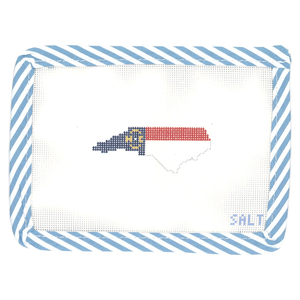 North Carolina state outline needlepoint canvas with blue striped edge trim